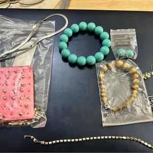 Mixed jewelry lot some new in pack  one missing clasp..